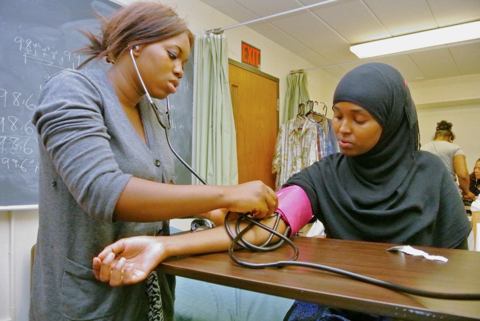 A student at the International Institute of Minnesota prepares for a healthcare career