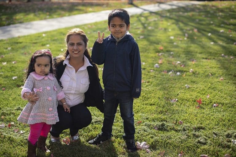 Nikita, College Readiness Academy student at International Institute of Minnesota, with her children