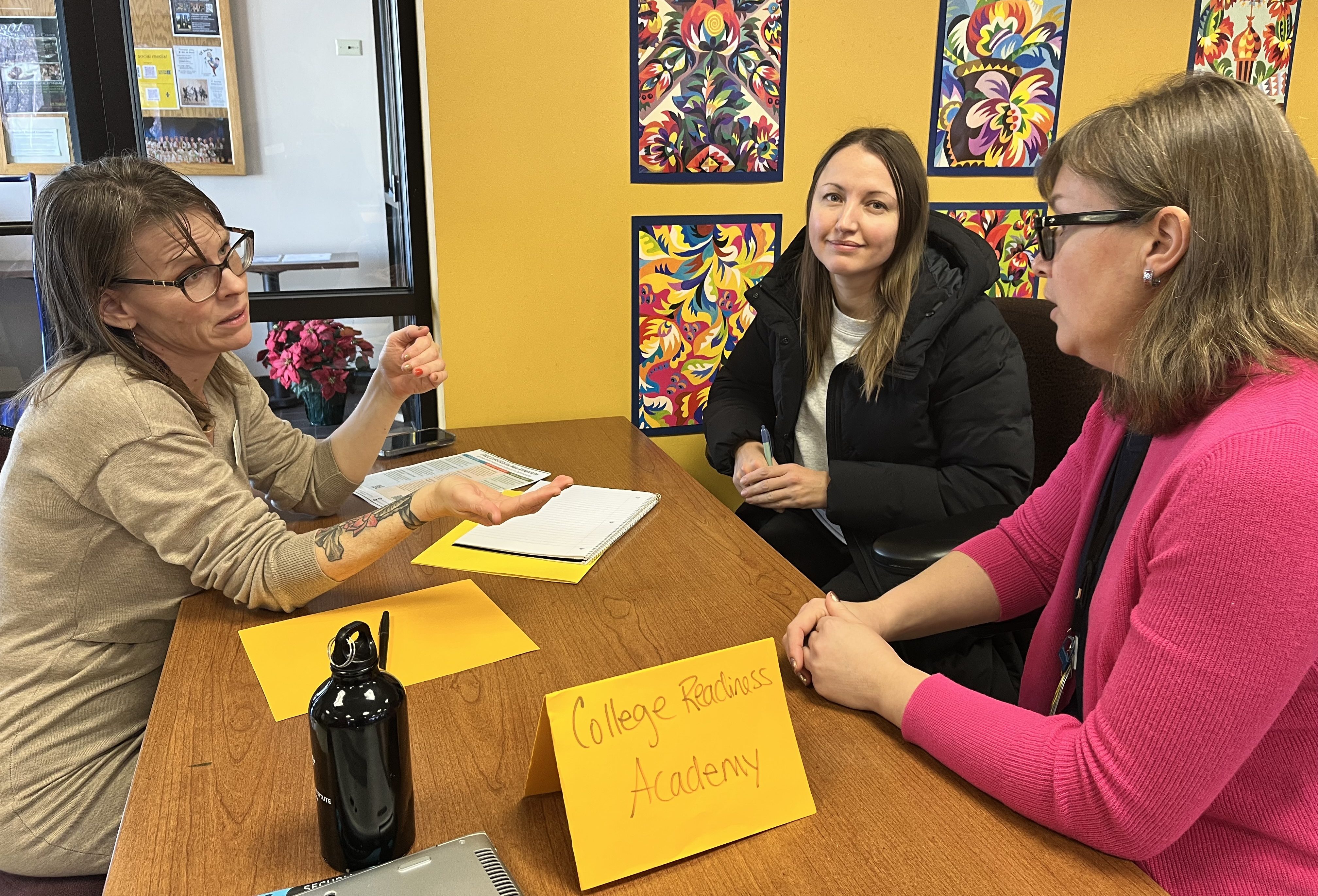 Elizabeth Fontaine, College Readiness Academy Program Manager, speaking with Ukrainians at the Ukrainian American Community Center.