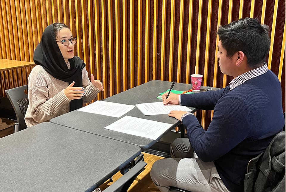 Two people conducting an professional interview