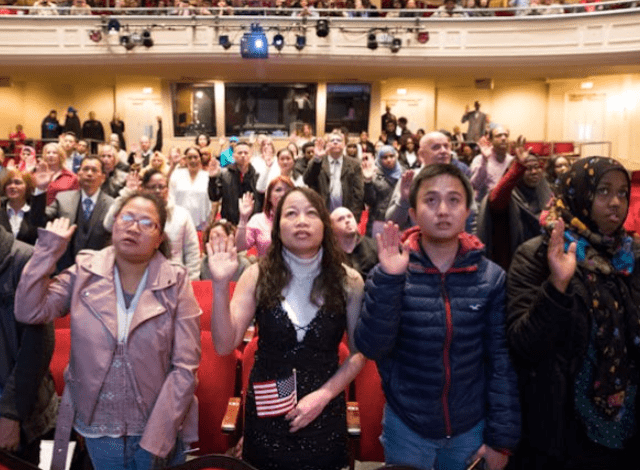 New U.S. citizens take the Oath of Allegiance to the United States.