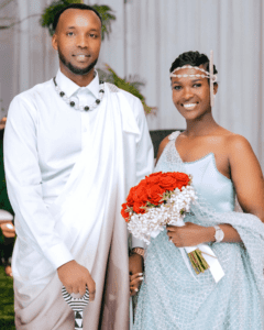 a man and a woman in their traditional wedding dress from the Democratic Republic of Congo