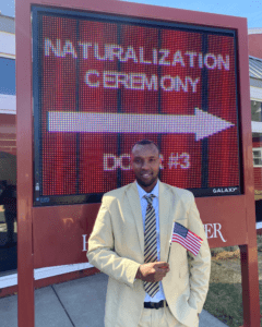 A man holds an American flag 