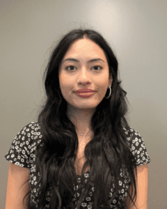 Woman with long, wavy, dark hair